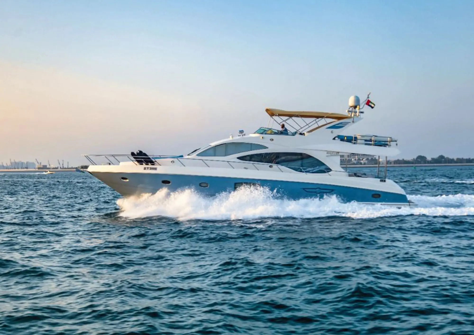 Blue Moon 64ft yacht cruising in Dubai Marina