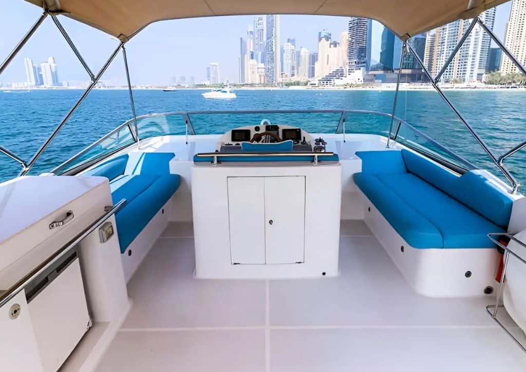 Blue Moon 64ft yacht cruising in Dubai Marina