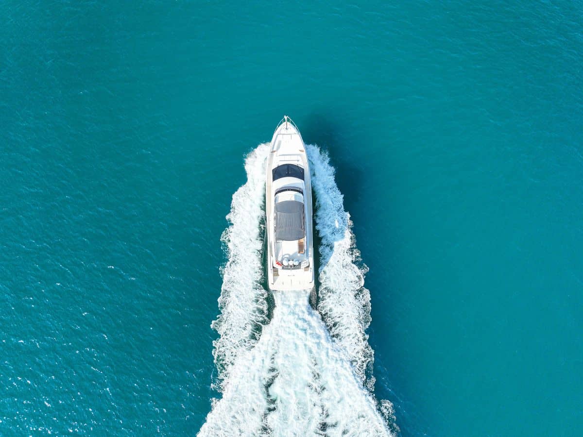 Luxury Vela 67ft yacht cruising in Dubai Marina waters