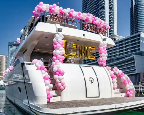 Luxury yacht decorated with balloons for a birthday party in Dubai Marina